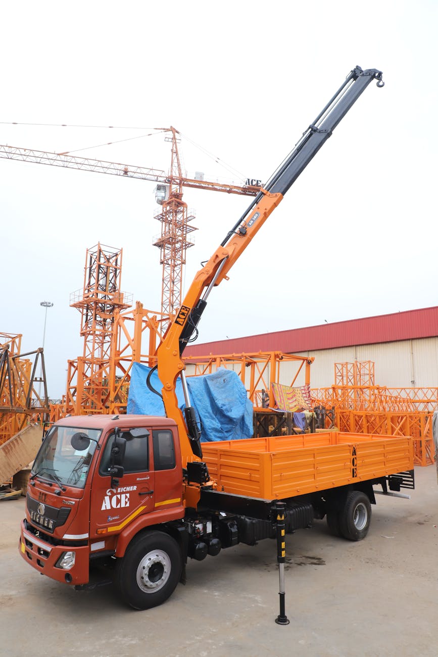 articulated boom truck with ace loader crane