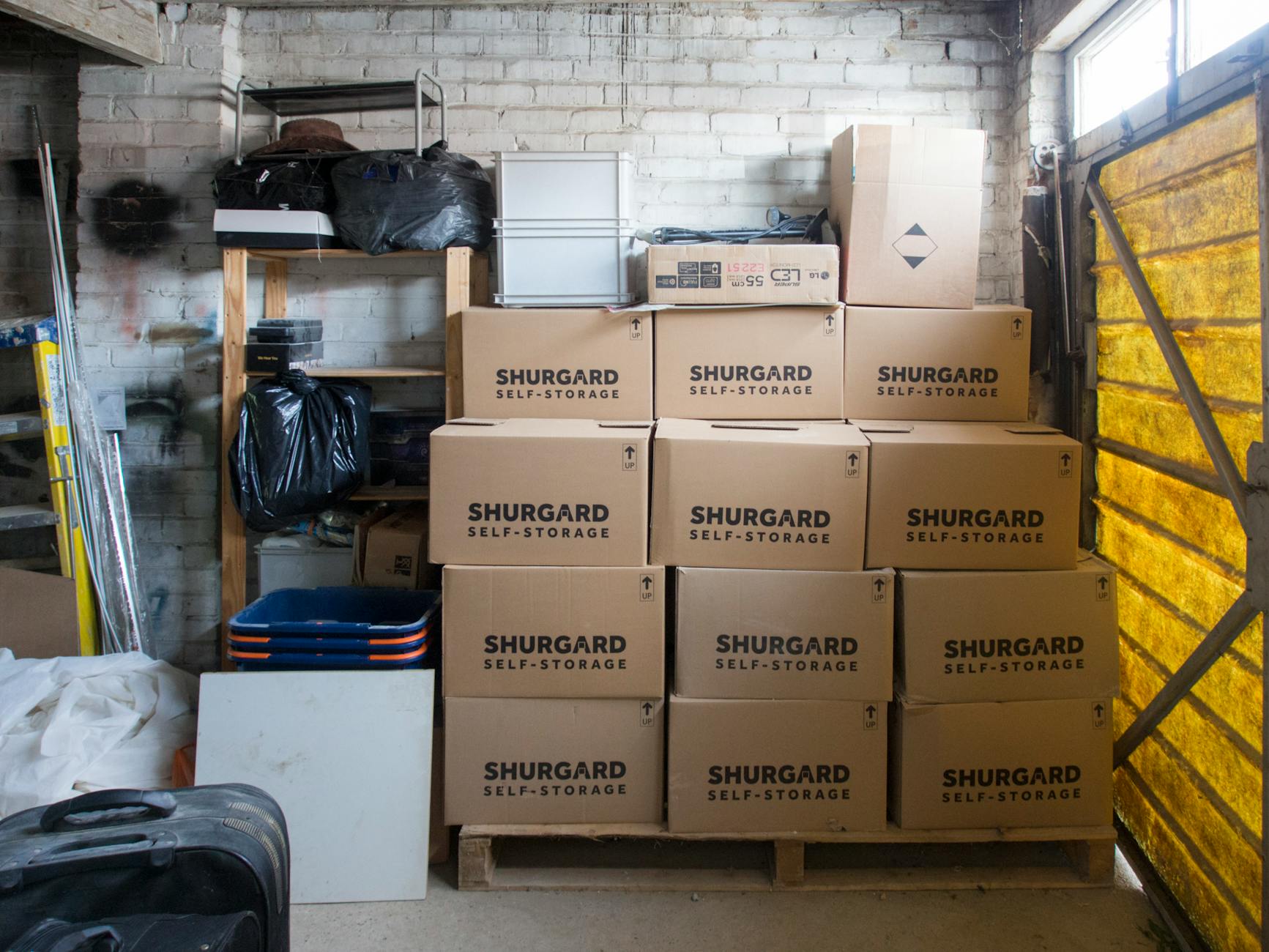 stacked storage boxes in warehouse interior